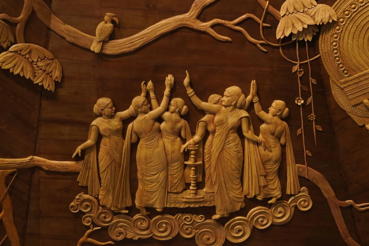 Timeless wooden relief carving of figures